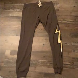 Comfy dark grey sweatpants with lighting bolt.